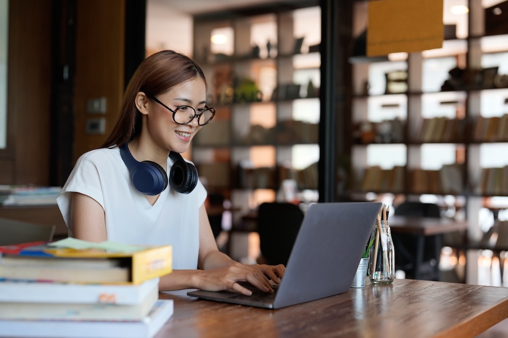 Woman learning on laptop